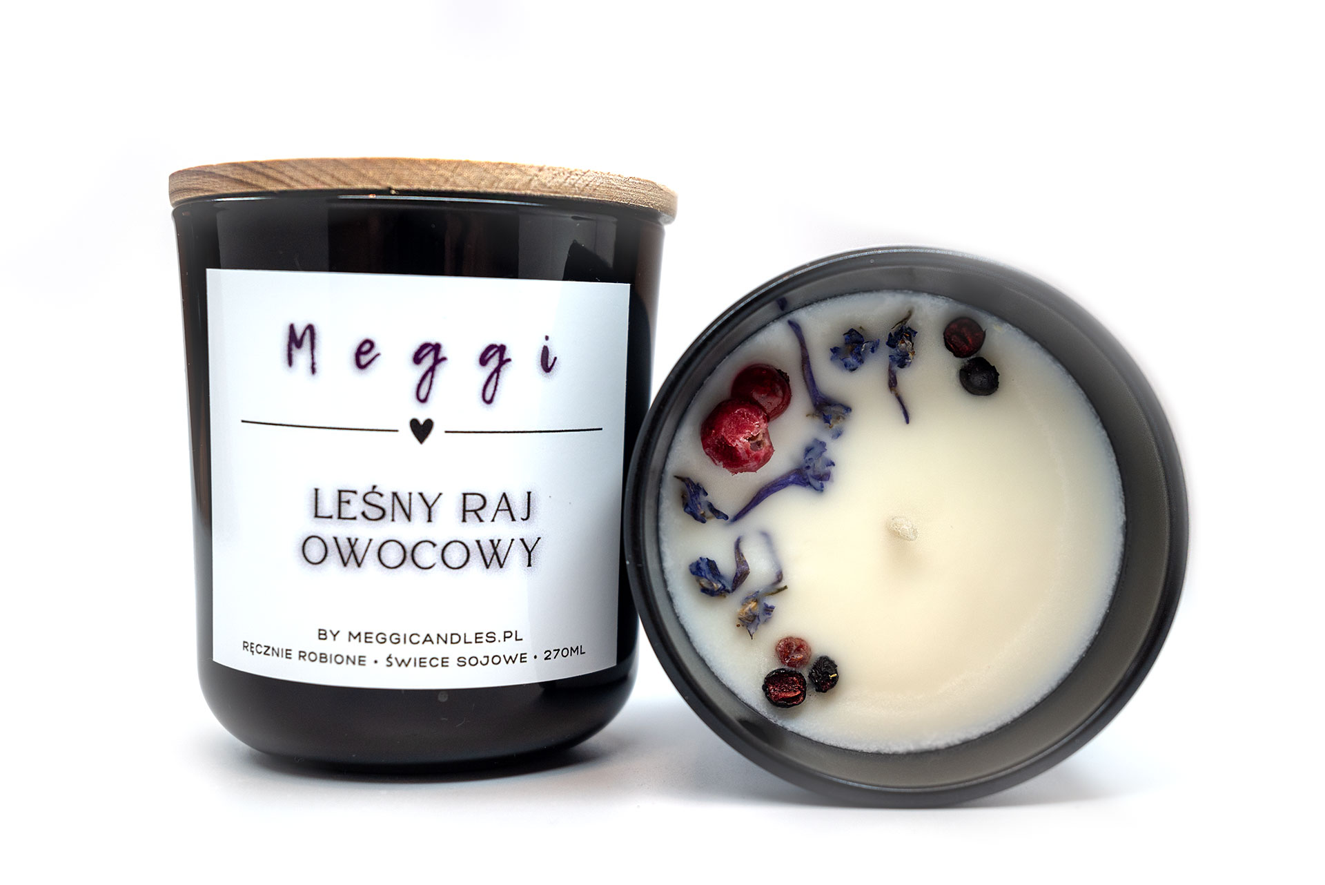 Połyskujące czarne szkło świecy sojowej Meggi z knotem bawełnianym - nowoczesny element dekoracyjny.